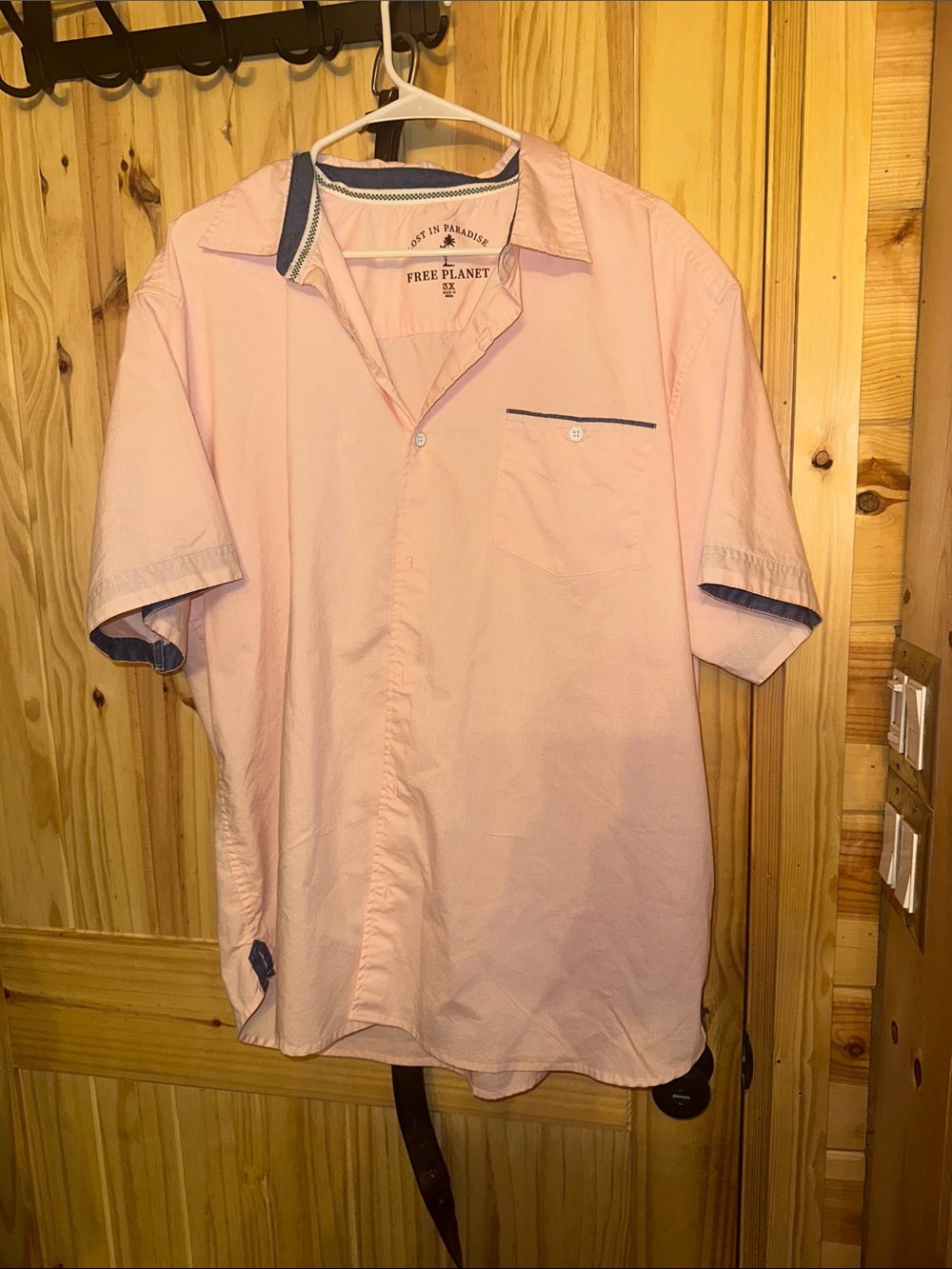 Free Planet Lost in Paradise button-down shirt in pink with blue trim.